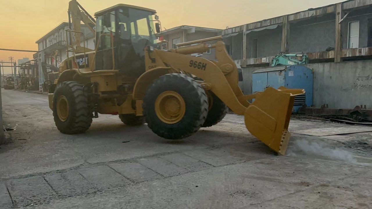 2020 Caterpillar 966H wheel loader, front three-quarter view 2020 Caterpillar 966H wheel loader, front three-quarter view
