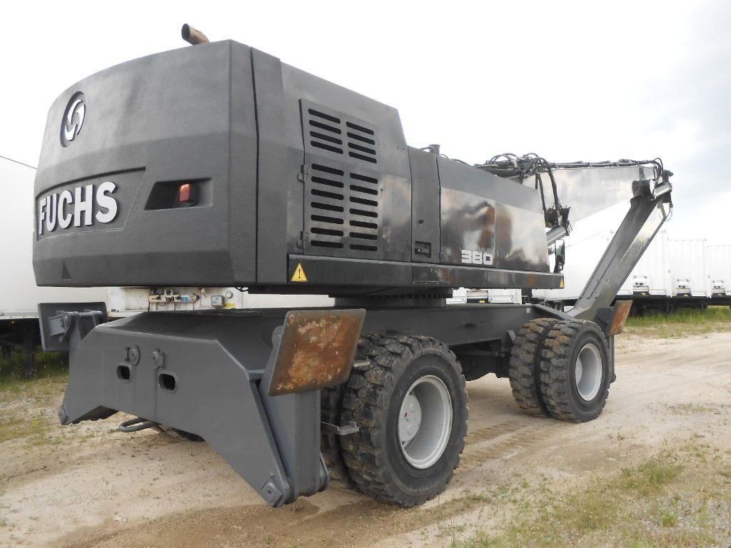 2000 Terex Fuchs MHL 380 material handler, rear three-quarter view