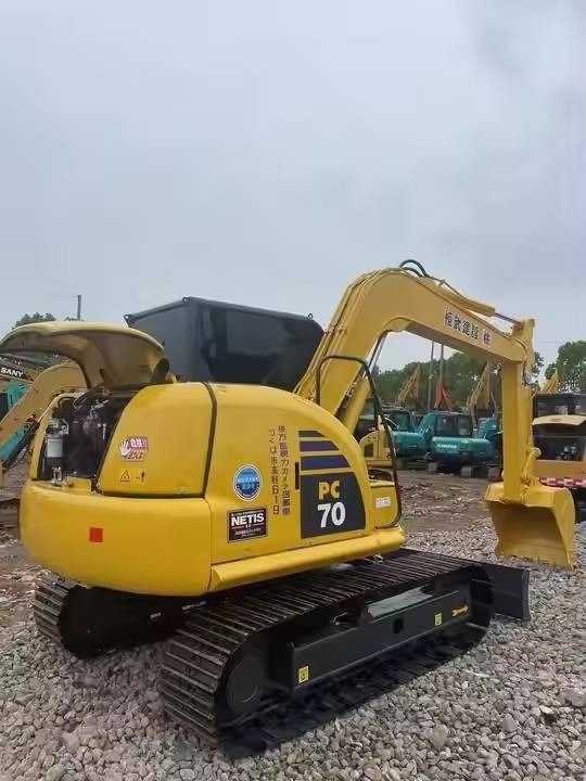 2023 Komatsu PC70-8 mini excavator, rear three-quarter view