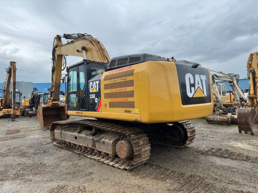 2013 Caterpillar 336EL crawler excavator, rear three-quarter view 2013 Caterpillar 336EL crawler excavator, rear three-quarter view