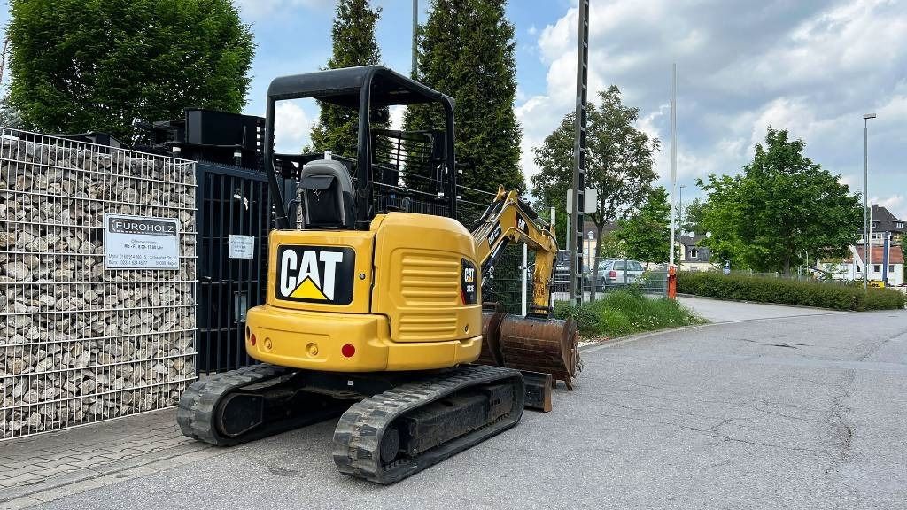 2018 Caterpillar 303E mini excavator, rear three-quarter view 2018 Caterpillar 303E mini excavator, rear three-quarter view