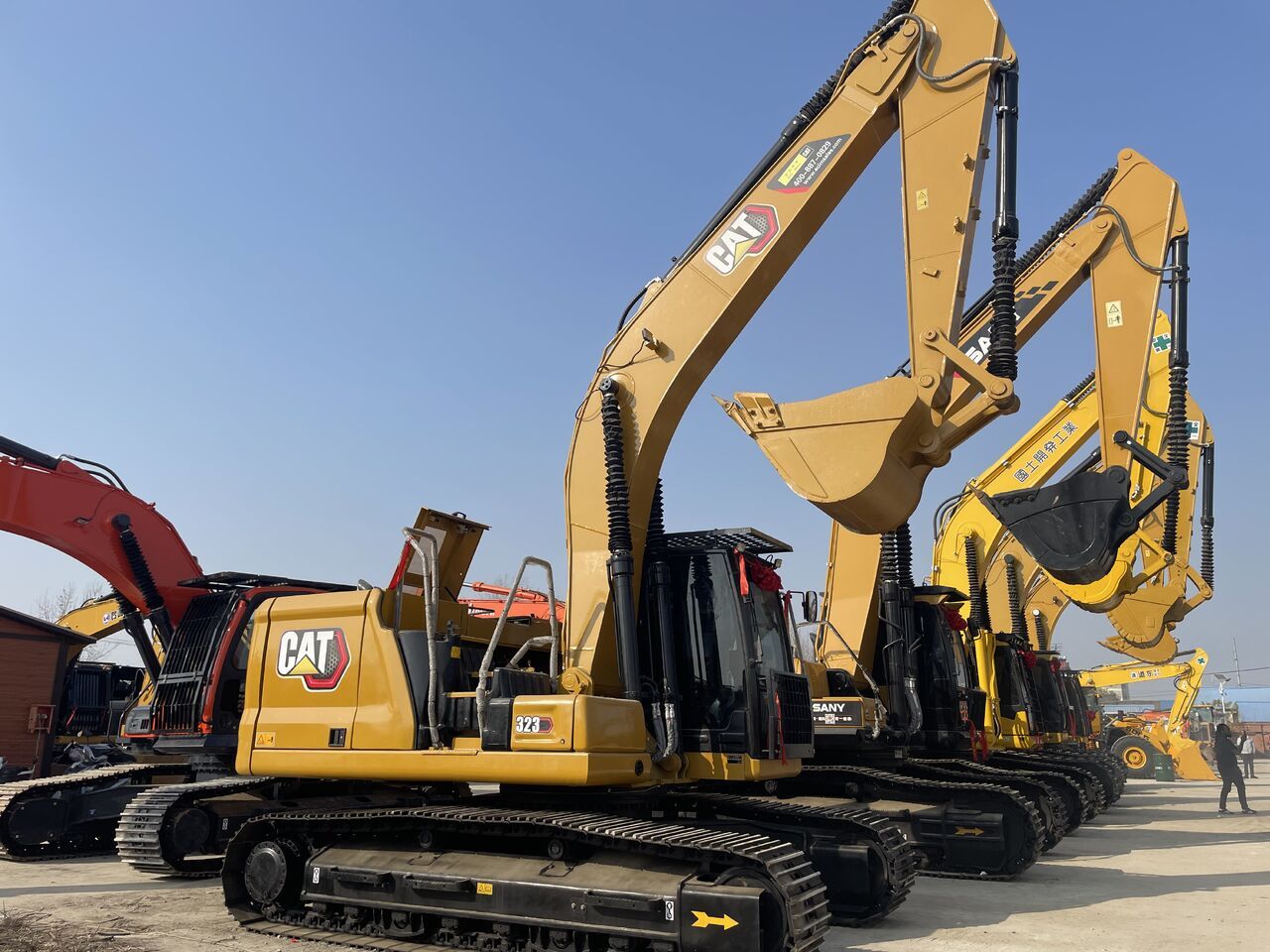 2024 Caterpillar 323 crawler excavator, side profile view 2024 Caterpillar 323 crawler excavator, side profile view