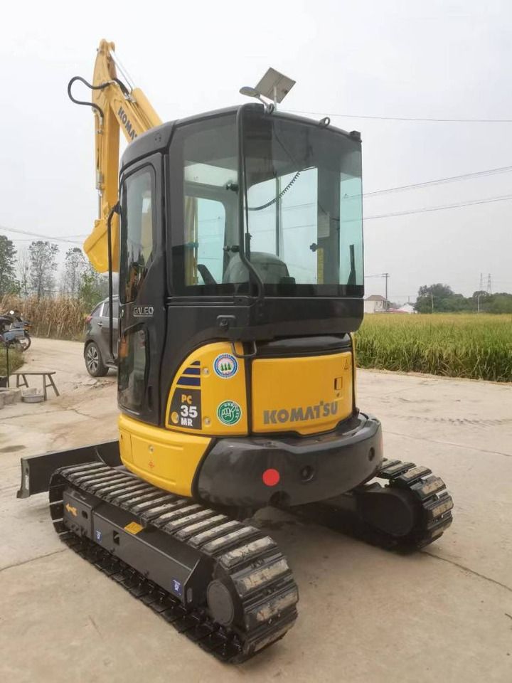 2023 Komatsu PC35MR mini excavator, rear three-quarter view 2023 Komatsu PC35MR mini excavator, rear three-quarter view