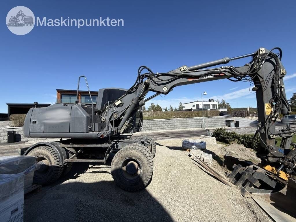 2012 Atlas 160W wheel excavator, side view