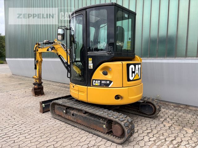 2017 Caterpillar 303.5E mini excavator, rear three-quarter view