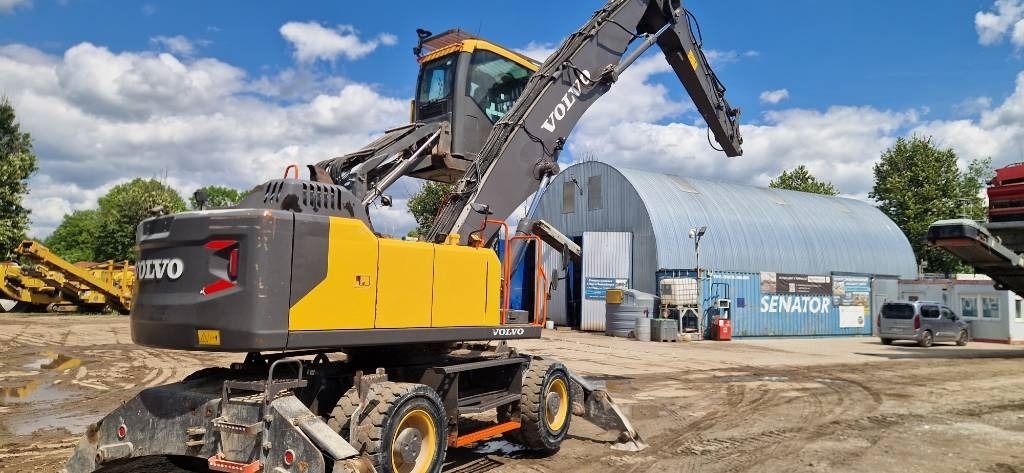 2018 Volvo EW240EMH material handler, rear three-quarter view