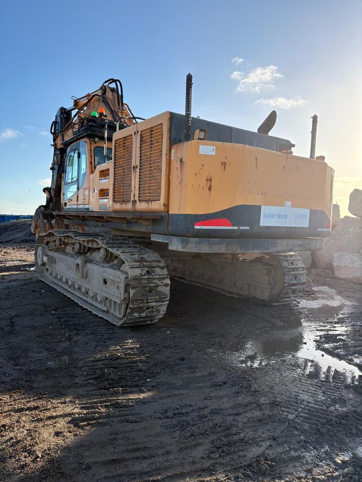 2013 Hyundai R800LC-9 crawler excavator, rear three-quarter view 2013 Hyundai R800LC-9 crawler excavator, rear three-quarter view