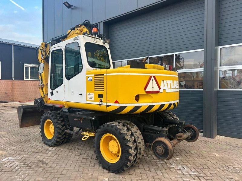 2000 Atlas 1404K wheel excavator, rear three-quarter view