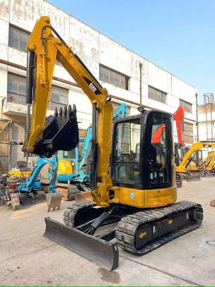 2022 Caterpillar 303.5 C CR mini excavator, front three-quarter view 2022 Caterpillar 303.5 C CR mini excavator, front three-quarter view