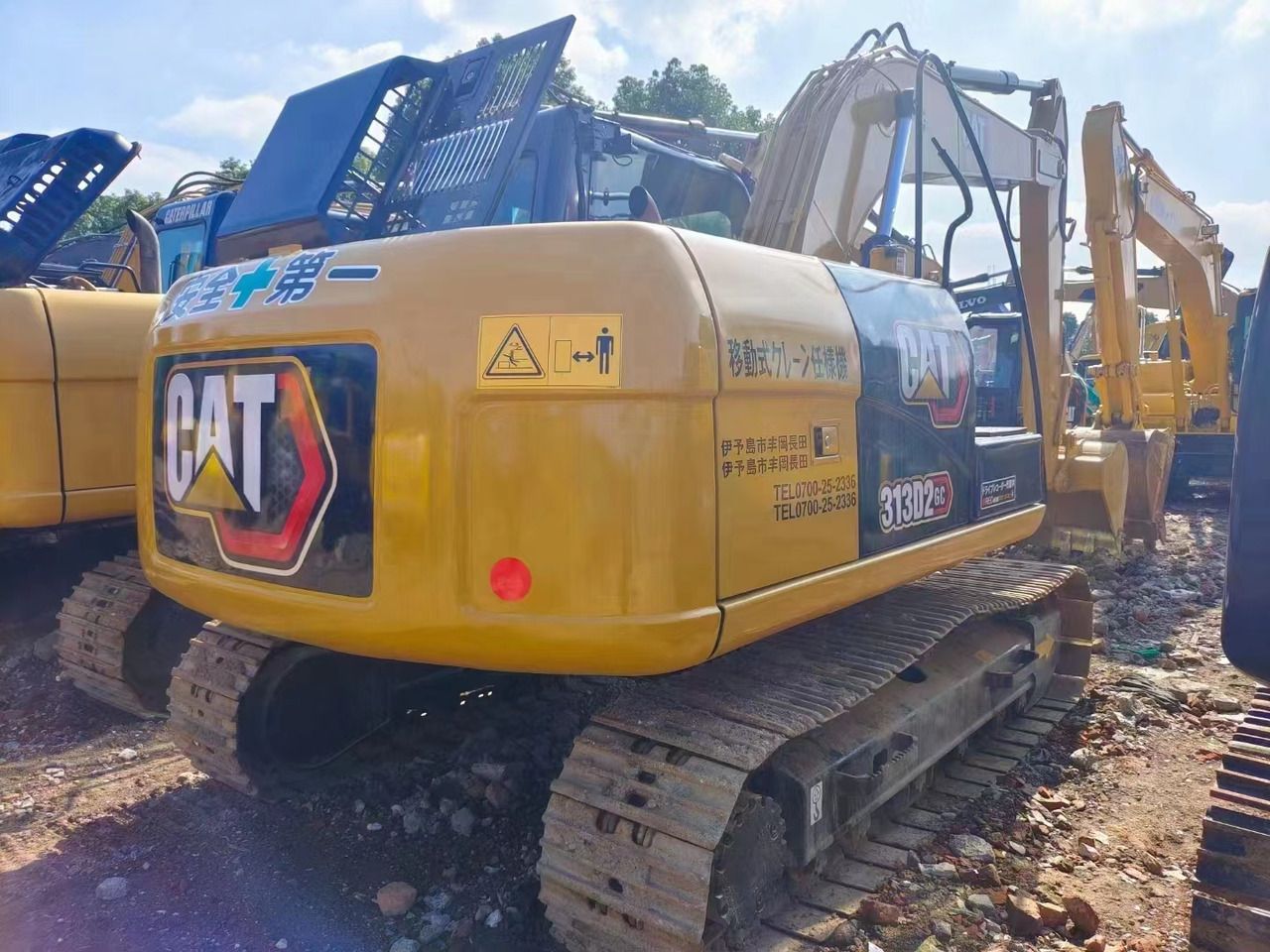 2020 Caterpillar 313D2 GC crawler excavator rear three-quarter view 2020 Caterpillar 313D2 GC crawler excavator rear three-quarter view