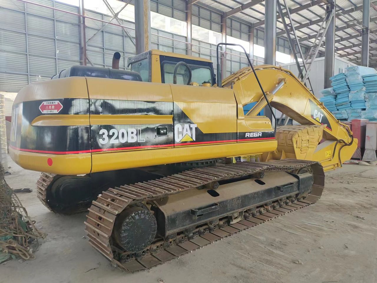 2018 Caterpillar 320BL crawler excavator, rear three-quarter view 2018 Caterpillar 320BL crawler excavator, rear three-quarter view