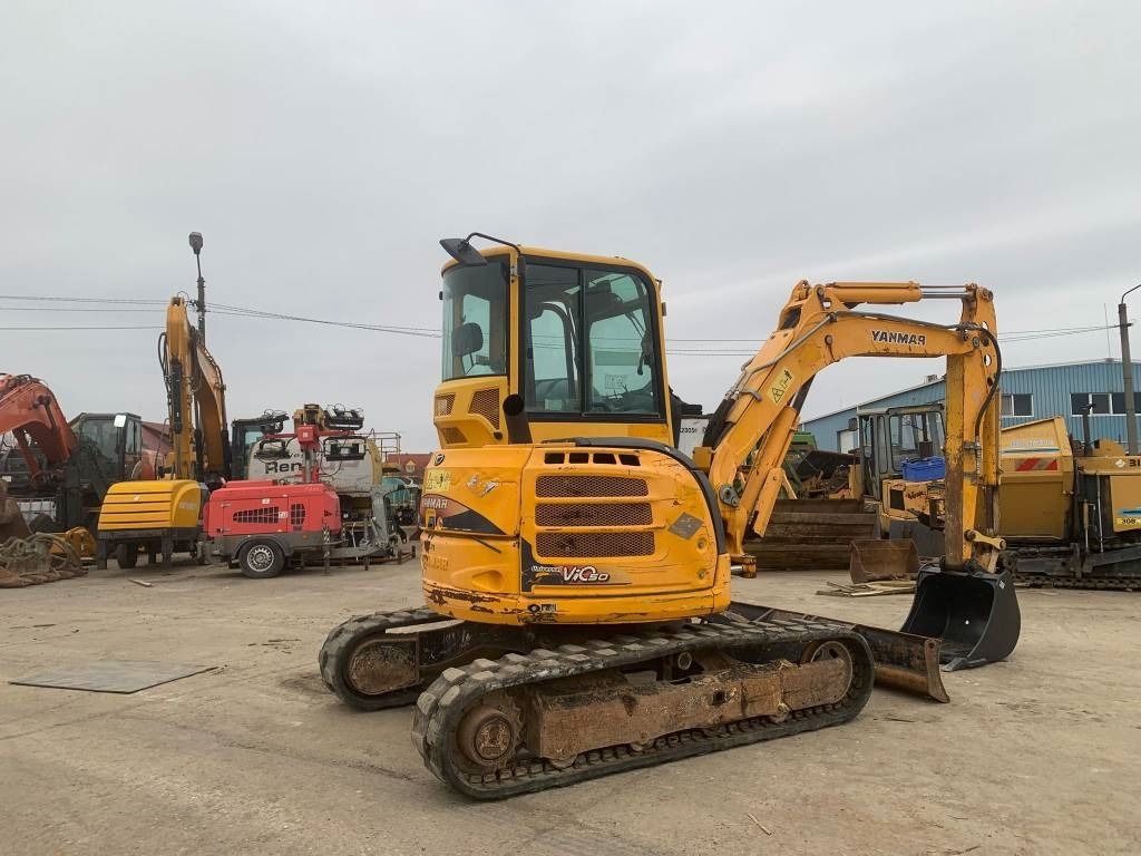2014 Yanmar VIO50-U mini excavator, rear three-quarter view 2014 Yanmar VIO50-U mini excavator, rear three-quarter view