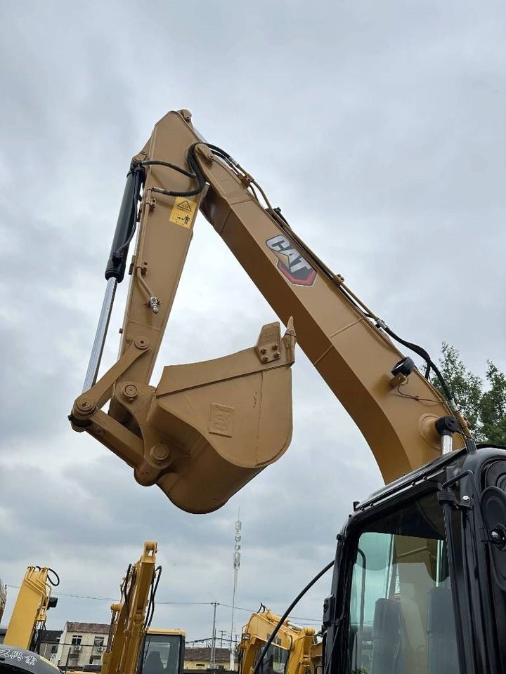 2024 Caterpillar 312D2 mini excavator boom and bucket view