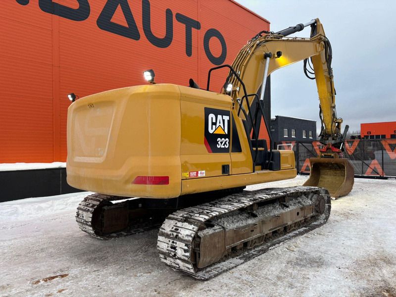 2018 Caterpillar 323 crawler excavator, rear three-quarter view
