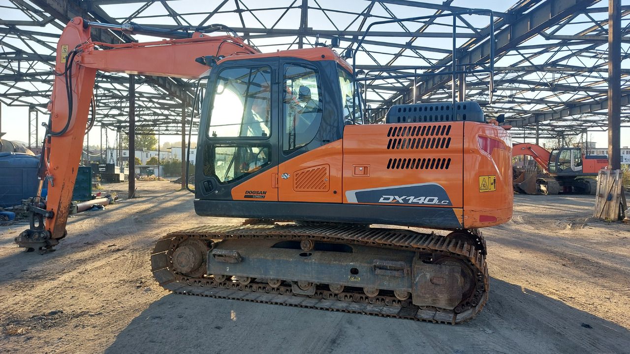 Doosan DX140LC-5 crawler excavator, side view