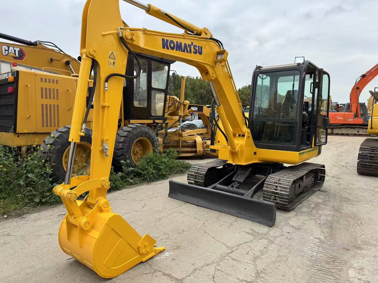 2020 Komatsu PC56 mini excavator, front three-quarter view