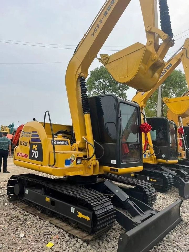 2024 Komatsu PC70-8 mini excavator, rear three-quarter view 2024 Komatsu PC70-8 mini excavator, rear three-quarter view