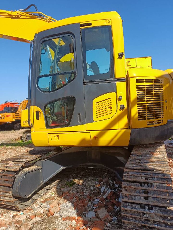 2023 Komatsu PC138US crawler excavator, side view of cab