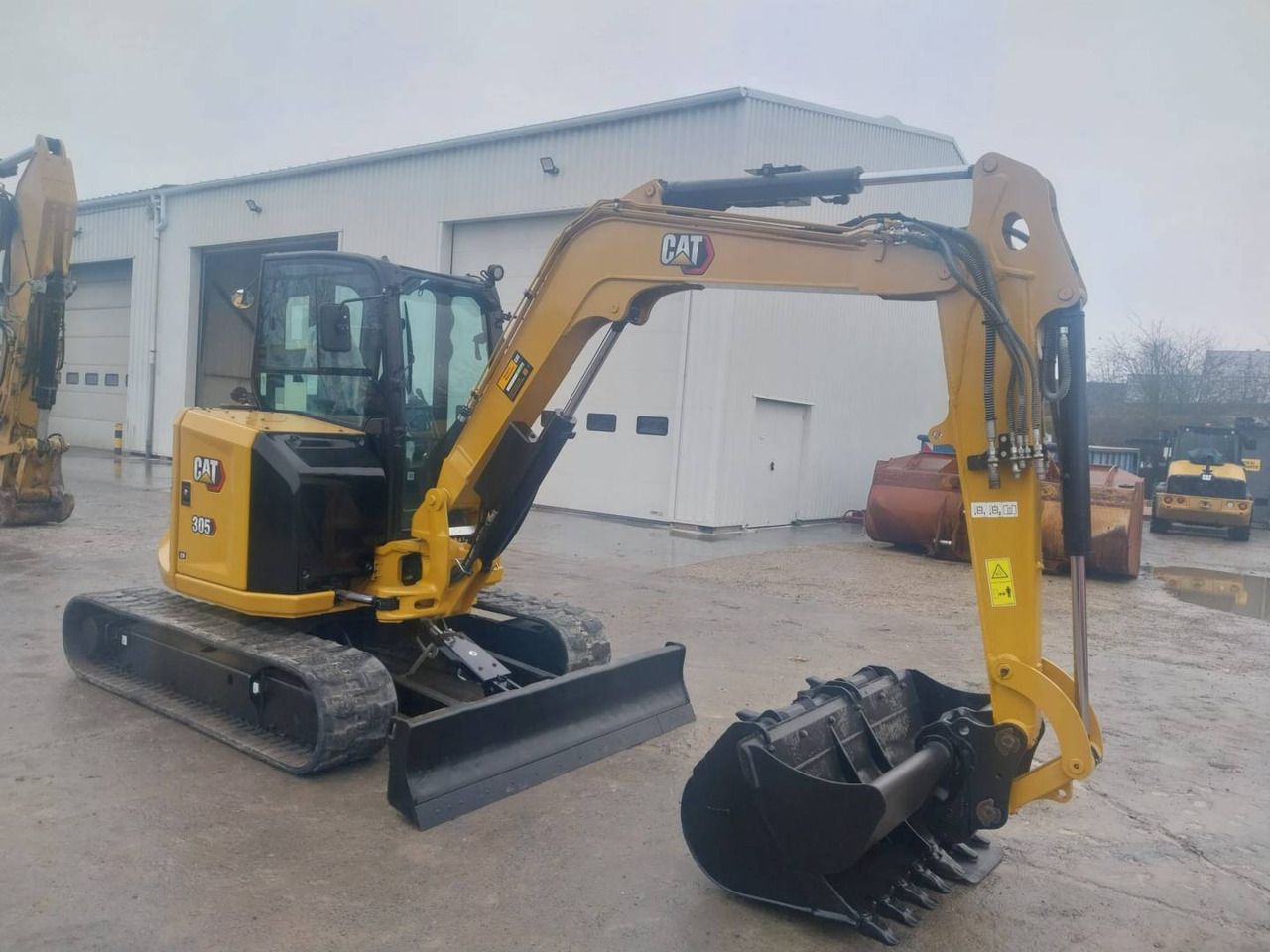 2023 Caterpillar 305 crawler excavator, side view
