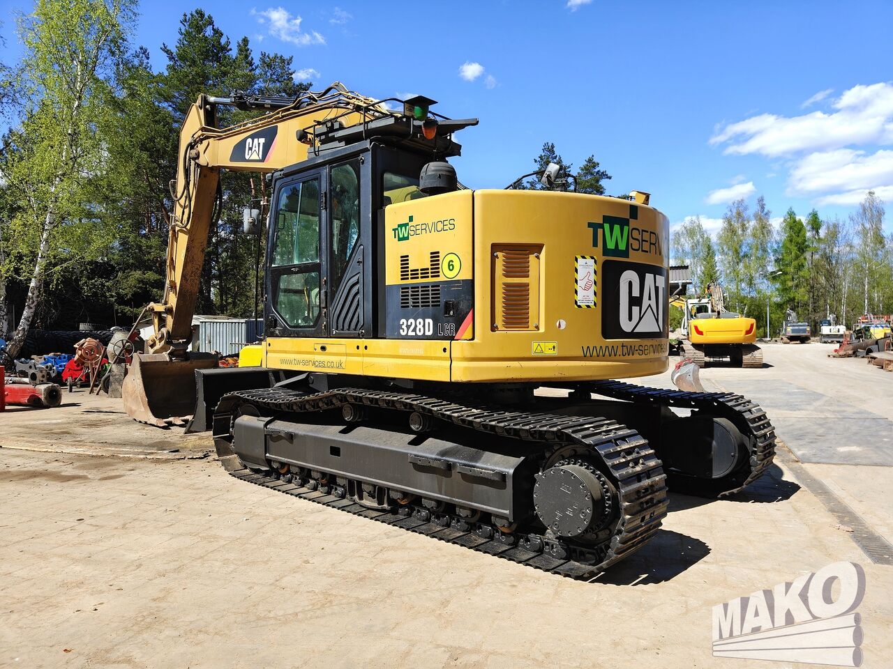 2012 Caterpillar 328D LCR crawler excavator, rear three-quarter view 2012 Caterpillar 328D LCR crawler excavator, rear three-quarter view