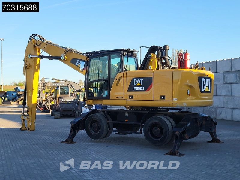 2019 Caterpillar MH3022 material handler, side view