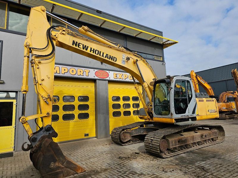 2008 New Holland E215B crawler excavator, side view 2008 New Holland E215B crawler excavator, side view