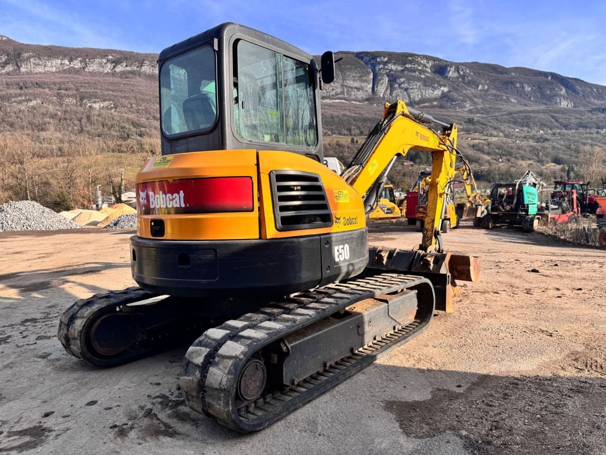 2013 Bobcat E50 mini excavator, rear three-quarter view 2013 Bobcat E50 mini excavator, rear three-quarter view