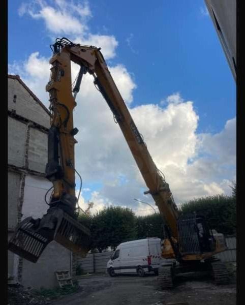 2014 JCB JS360 demolition excavator, side view with high-reach boom