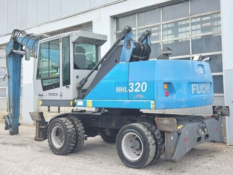2016 Fuchs MHL320D material handler, side view