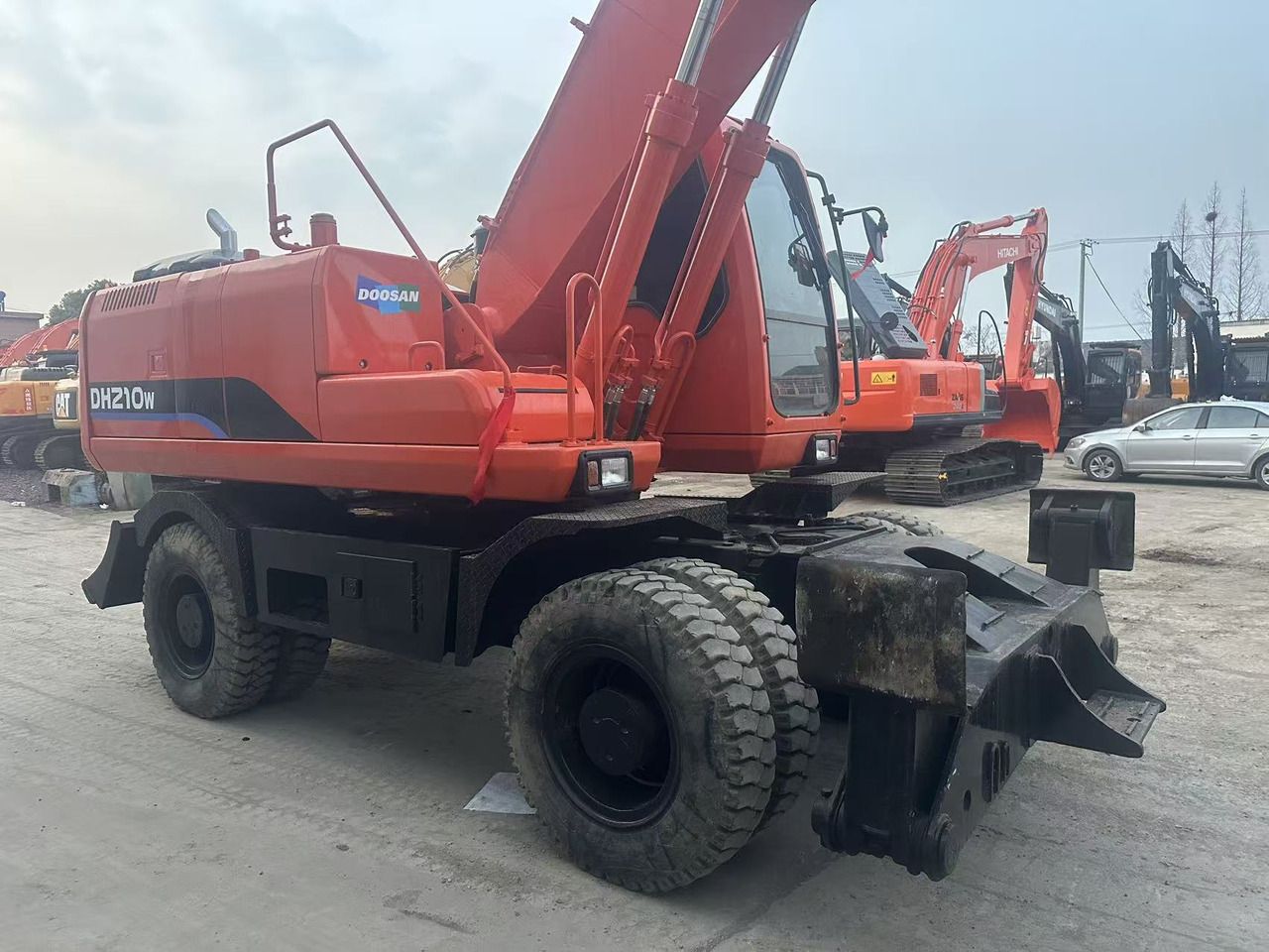 2022 Doosan DH210W wheel excavator, rear three-quarter view