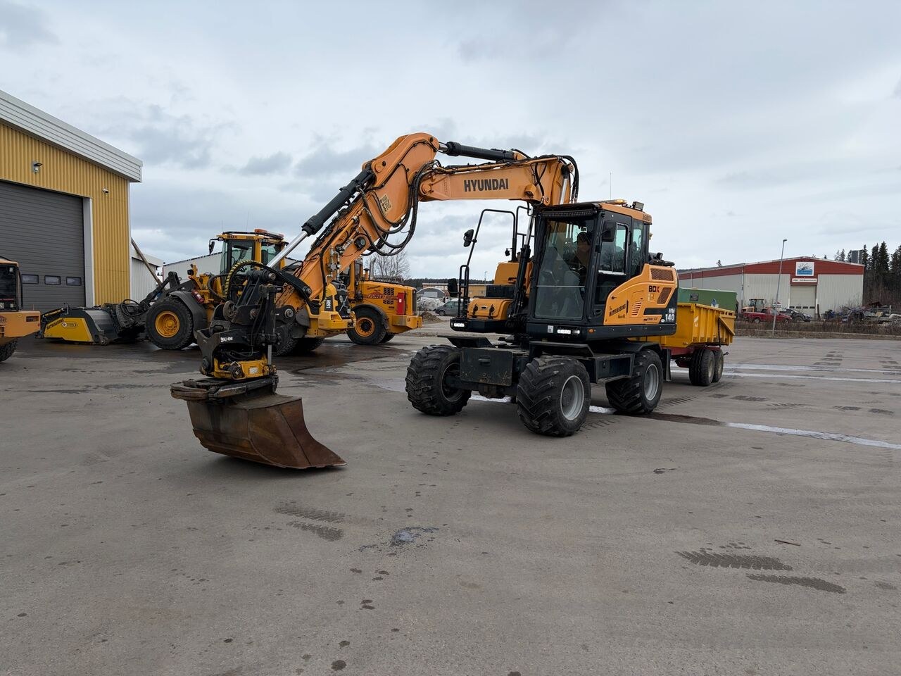 2016 Hyundai HW140 wheel excavator, front three-quarter view 2016 Hyundai HW140 wheel excavator, front three-quarter view