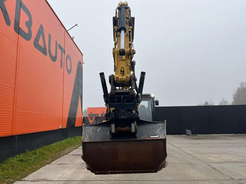 2019 Caterpillar 320 crawler excavator front view with bucket