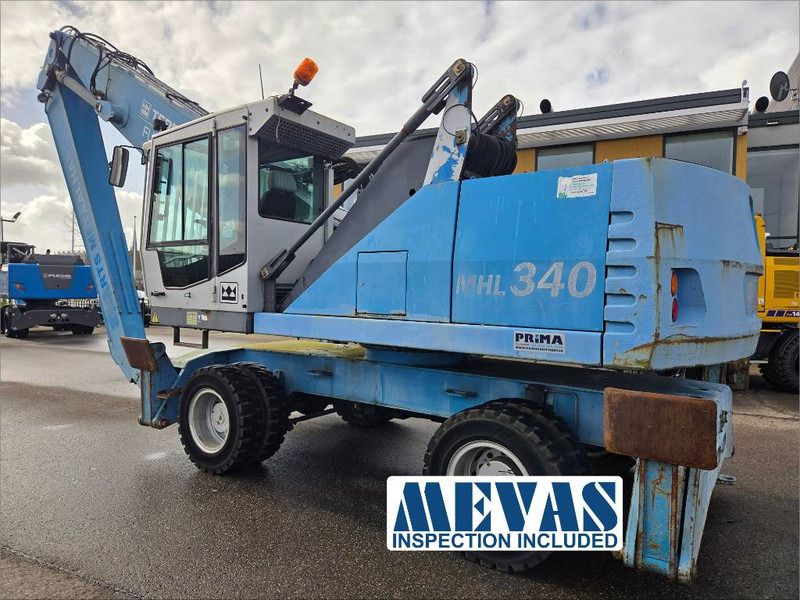 2007 Fuchs MHL340 D material handler, side view