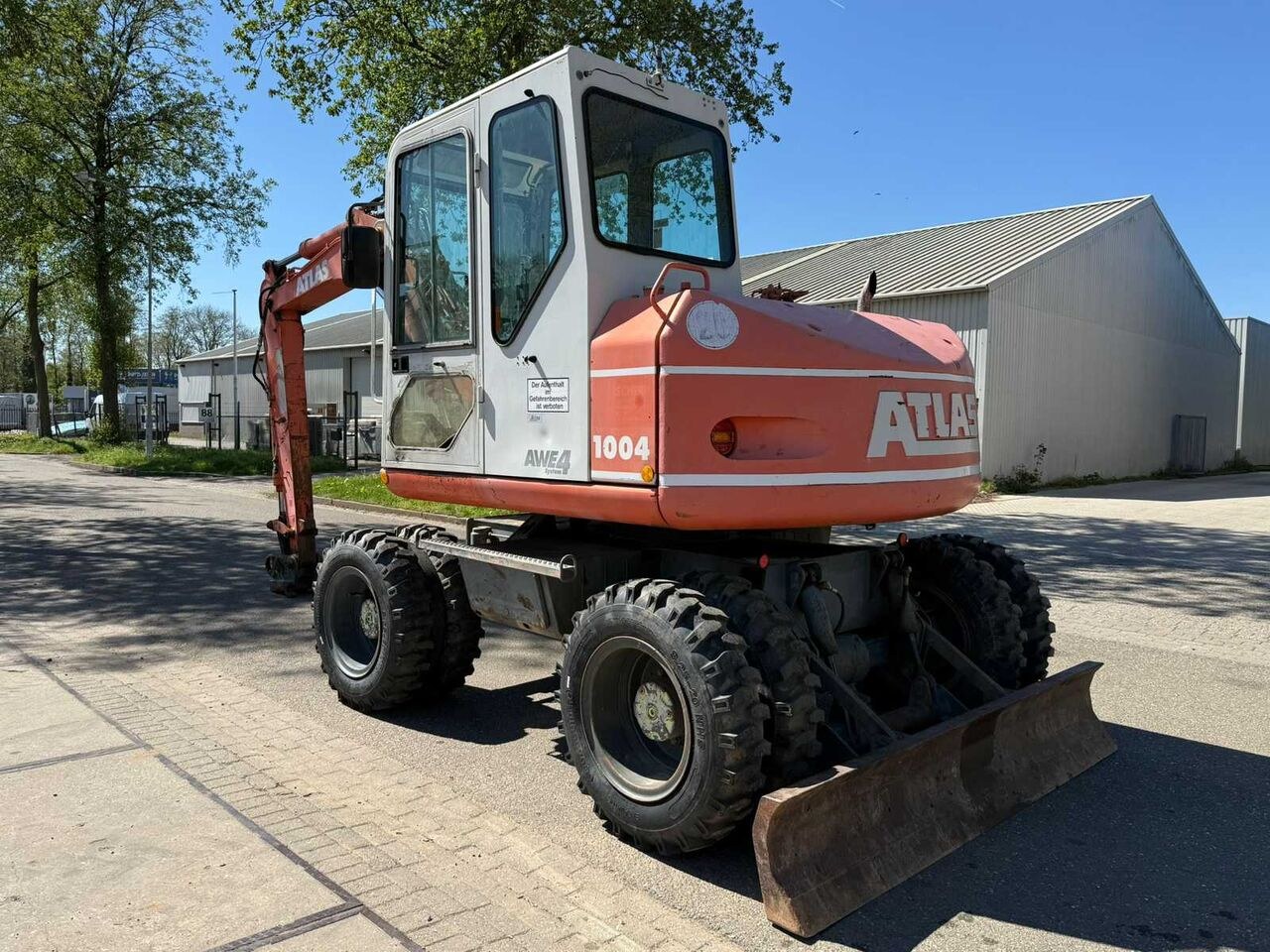 2001 Atlas 1004 M wheel excavator, rear three-quarter view 2001 Atlas 1004 M wheel excavator, rear three-quarter view