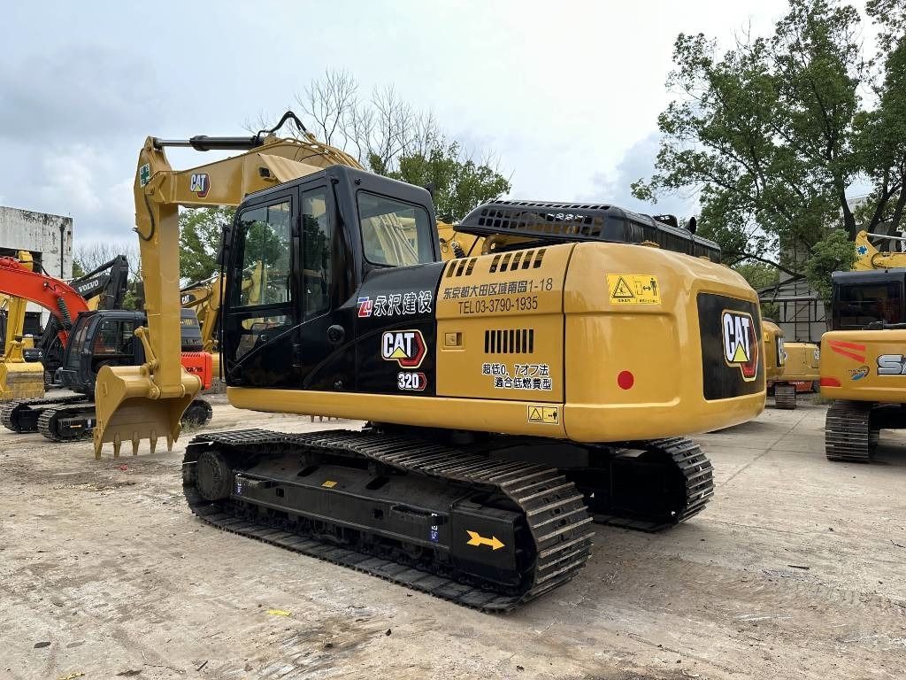 2023 Caterpillar 320D paletli ekskavatör, arka üç çeyrek görünüm 2023 Caterpillar 320D paletli ekskavatör, arka üç çeyrek görünüm