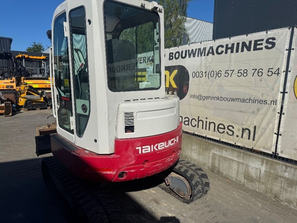 2007 Takeuchi TB138 FR mini excavator rear view 2007 Takeuchi TB138 FR mini excavator rear view