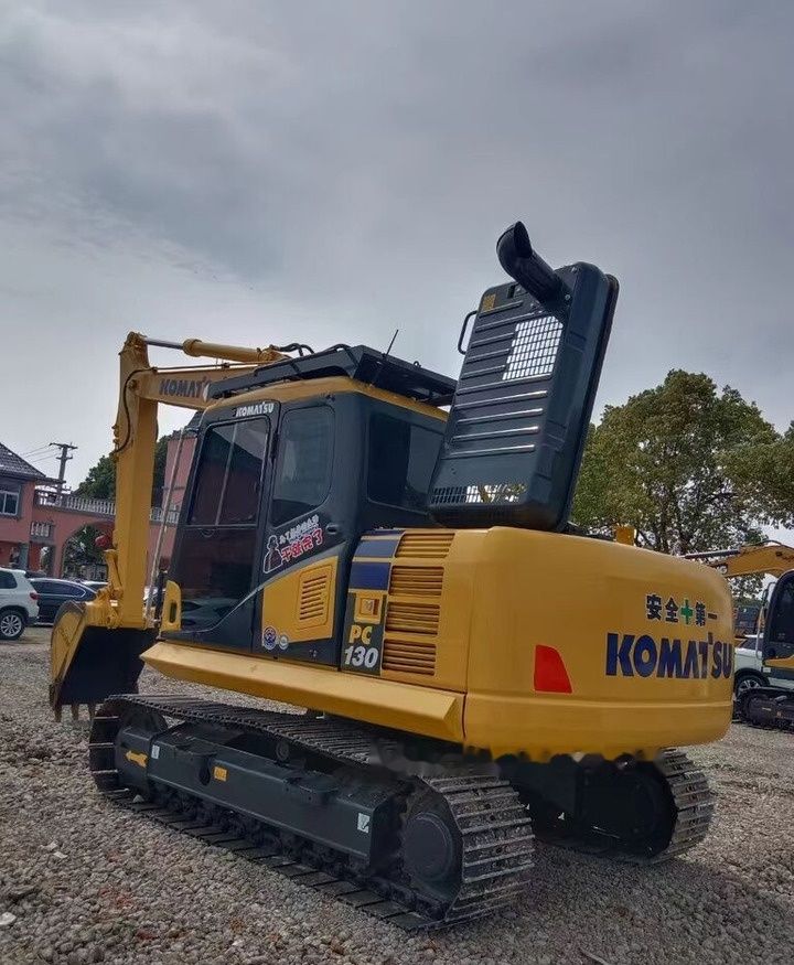2019 Komatsu PC130 crawler excavator, rear three-quarter view 2019 Komatsu PC130 crawler excavator, rear three-quarter view