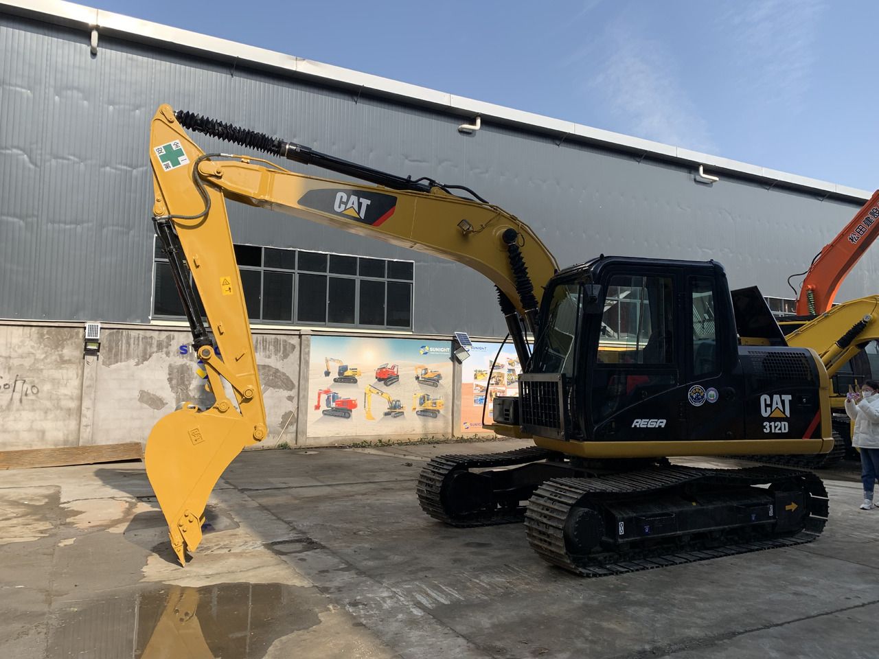 2022 Caterpillar 312D crawler excavator, side view