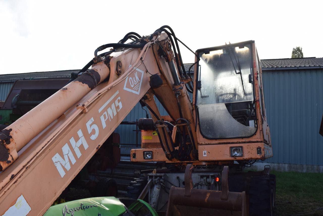 1990 O&K MH 5 PMS wheel excavator, side view 1990 O&K MH 5 PMS wheel excavator, side view