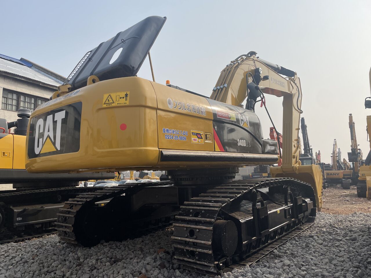 2024 Caterpillar 340D2L crawler excavator, rear three-quarter view