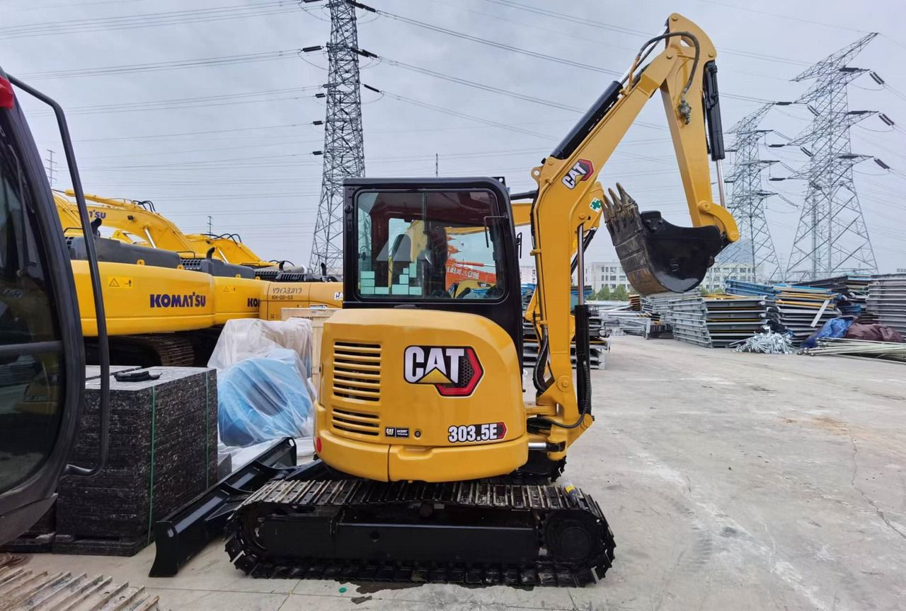 2023 Caterpillar 303.5E mini excavator, rear three-quarter view 2023 Caterpillar 303.5E mini excavator, rear three-quarter view