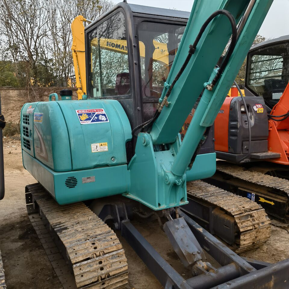 2024 Kobelco SK60-8 mini excavator, rear three-quarter view 2024 Kobelco SK60-8 mini excavator, rear three-quarter view