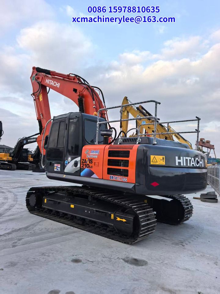 2023 Hitachi Zaxis 210LC crawler excavator, rear three-quarter view 2023 Hitachi Zaxis 210LC crawler excavator, rear three-quarter view