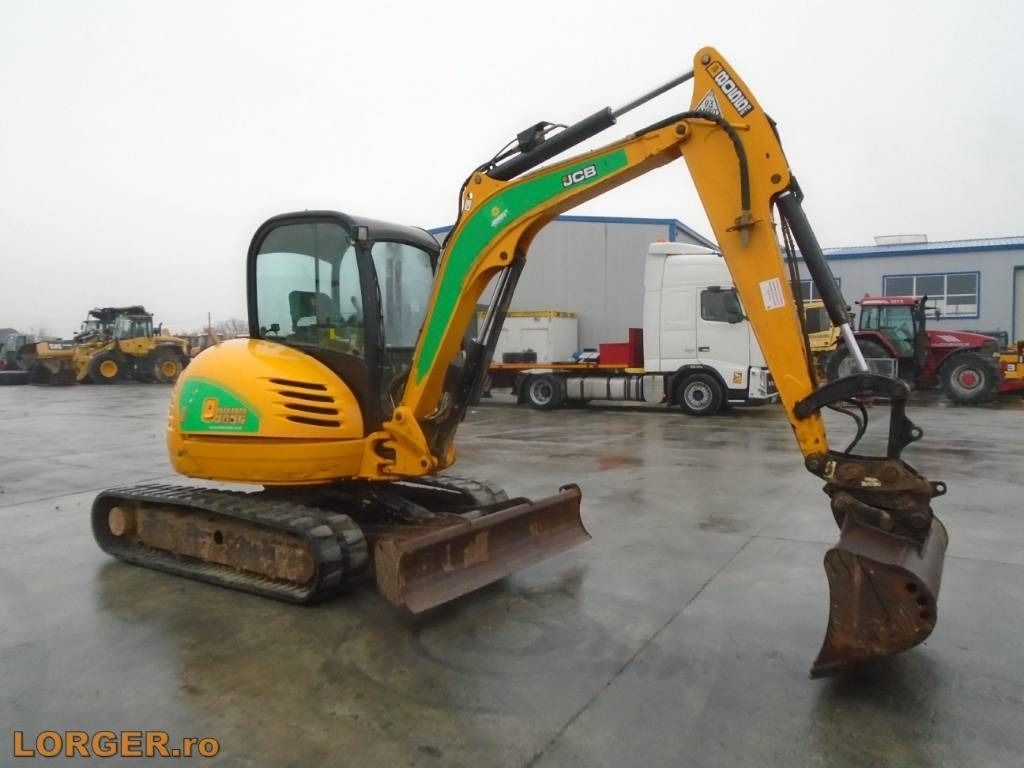 2015 JCB 8055 RTS mini excavator, side view 2015 JCB 8055 RTS mini excavator, side view