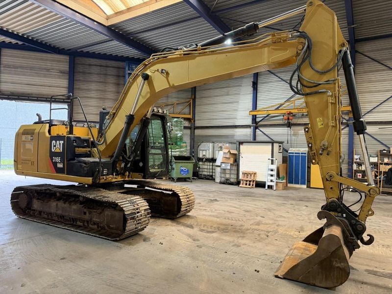 2014 Caterpillar 316E L crawler excavator, side profile view