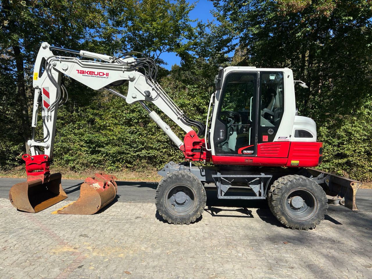 2015 Takeuchi TB295W wheel excavator side view