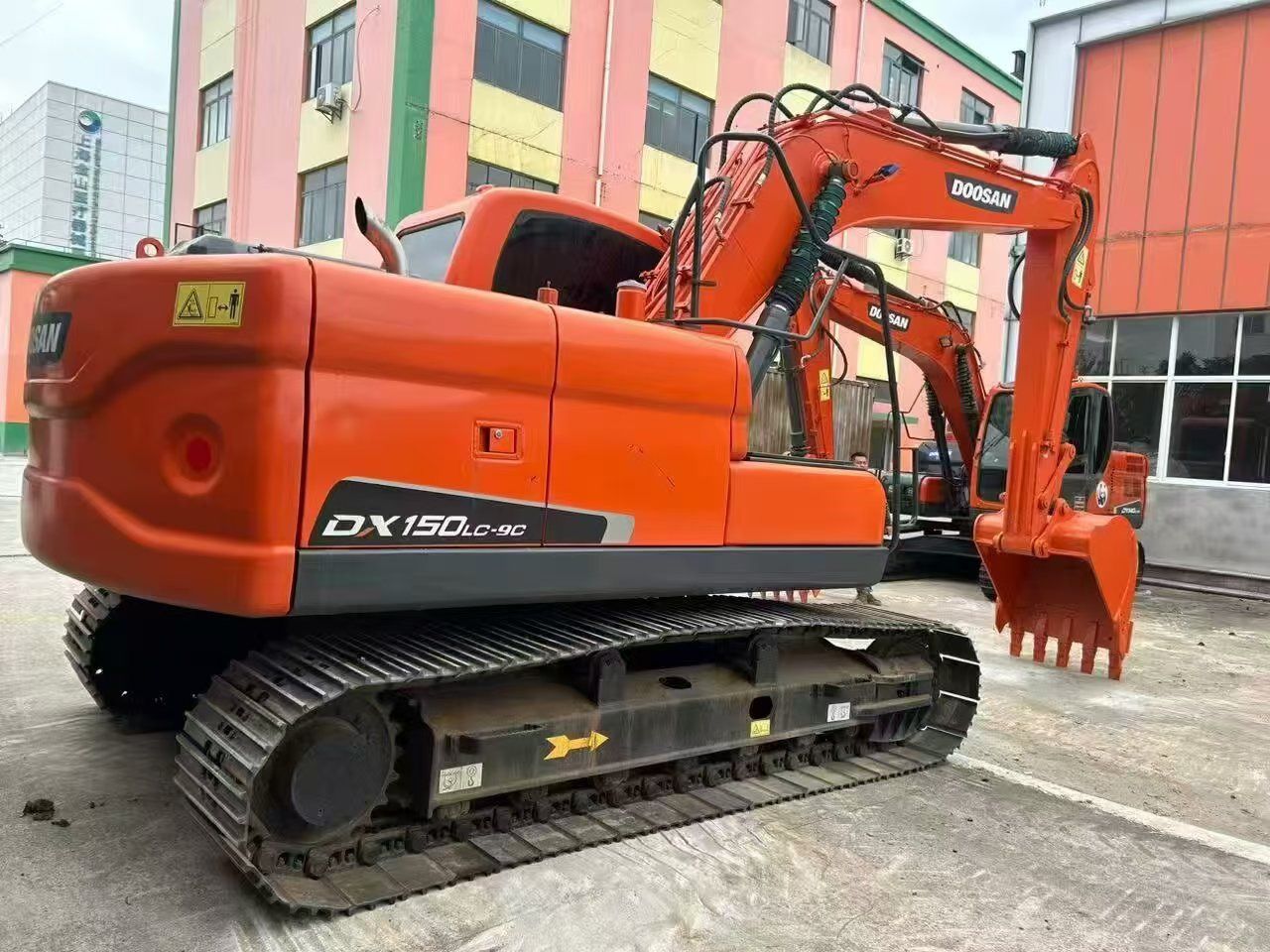 2023 Doosan DX150LC-9C crawler excavator, rear three-quarter view 2023 Doosan DX150LC-9C crawler excavator, rear three-quarter view