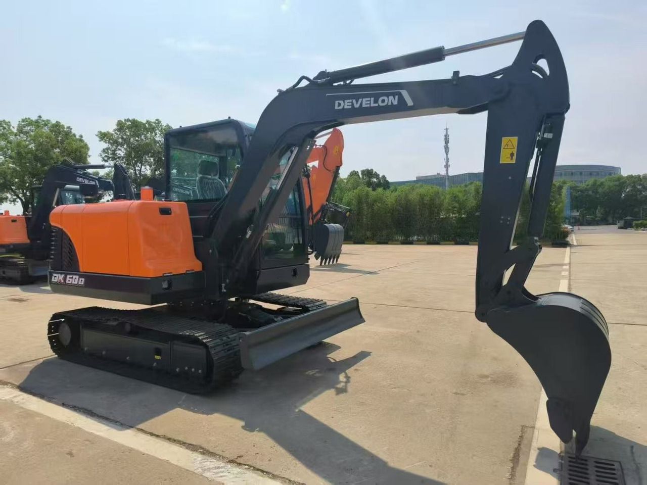 2026 Doosan DX60D mini excavator, side profile view 2026 Doosan DX60D mini excavator, side profile view