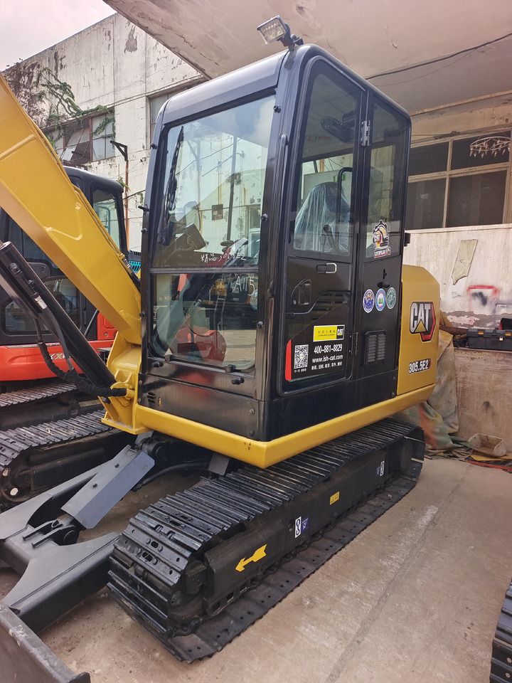 2024 Caterpillar 305.5E2 mini excavator, side view 2024 Caterpillar 305.5E2 mini excavator, side view