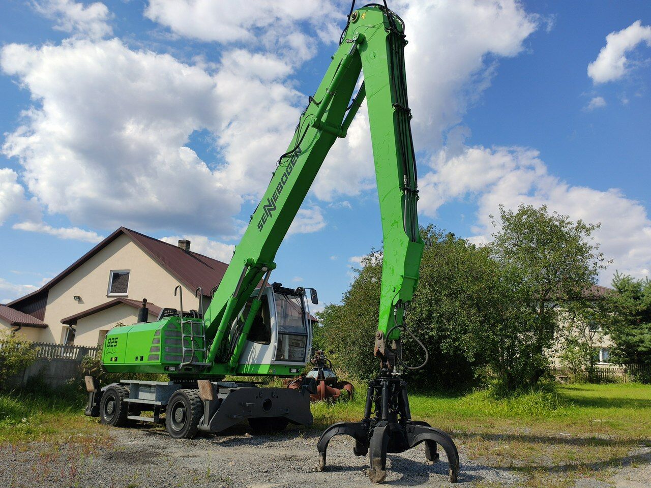 2012 Sennebogen 825 material handler, side view